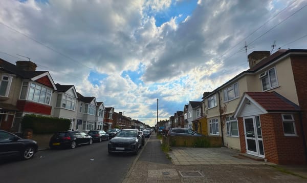 looking down a typical residential street in Hounslow, in the suburbs of london.