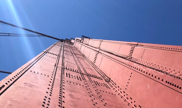 closeup of a tower on the golden gate bridge