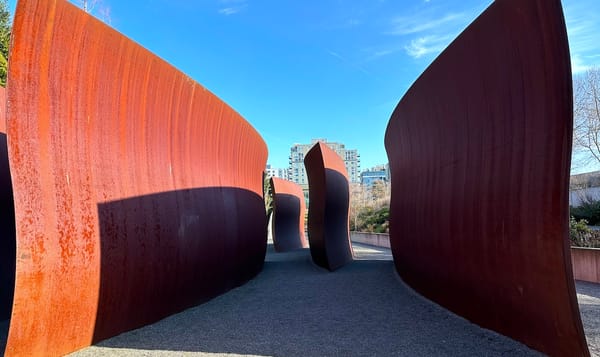 oxidized sheet metal undulating in richard serra's "waves"