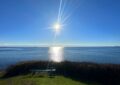 view of the afternoon sun from the cliffs at beacon hill park in victoria, bc